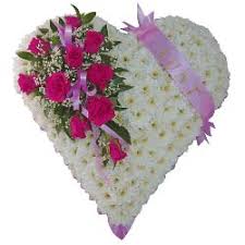 Based white closed heart tribute, ribbon edging and flower cluster available in any colour of your choice red, orange, yellow, purple, pink etc. Funeral Heart Tributes Wreaths Flowers