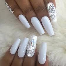 Coffin nail designs are the favorite among celebrities these days who have adopted this trend in a big way. The Most Stylish Ideas For White Coffin Nails Design Coffin Nails Designs White Diamond Nails Best Nail Art Designs