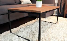 This is an easy and inexpensive project and you could customize it with whatever stain or paint you choose. Diy Metal Wood Coffee Table No Welding Diy Huntress