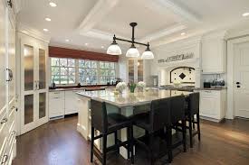 When purchasing an island always measure your space so there's ample room for foot traffic. White Kitchen Large Square Island Dark Stools House Plans 85682