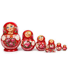 red nesting dolls matryoshka stacking