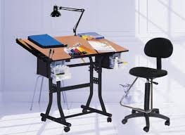 The defining feature for a drafting table is the ability to angle the surface of the table up to around 45 degrees from the horizontal. Drafting Table Computer Desk Combo Computer Desk Table News