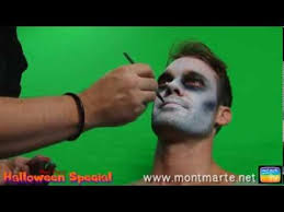 a zombie using face paint