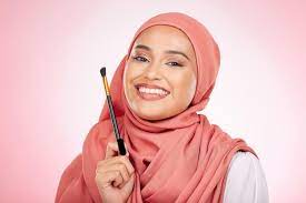muslim woman with makeup brush