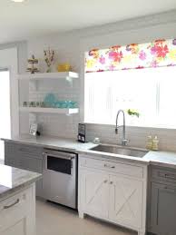 Here's a more monochromatic white kitchen that we found while scrolling through pinterest. Remodelaholic Grey And White Kitchen Cabinet Ideas