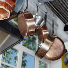 diffe ways to hang pans in the kitchen