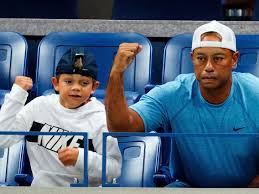 Tiger woods and son charlie will team up for the pnc championship. Video Tiger Woods Caddies For Son Charlie At Junior Golf Event Business Insider