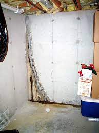 basement floor wall repair in