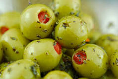 How much sodium is in a green olive with pimento?
