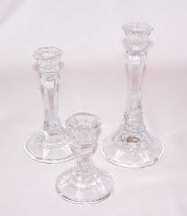 A 4 Glass Candle Stick Holder At
