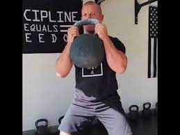 kettlebell squats using 68kg kettlebell