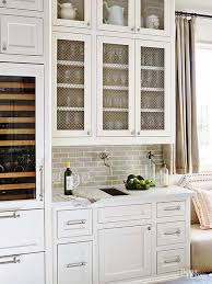 I actually have another cabinet in the dining room that i am considering adding the chicken wire to the back of each glass panel, leaving the glass intact. Pin By Dave Paronto On Makeover Ideas Cottage Kitchen Design Kitchen Cabinets Chicken Wire Cabinets