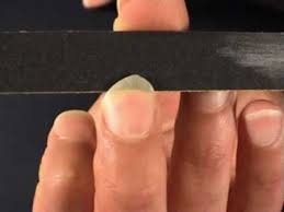 shape your nails for clical guitar