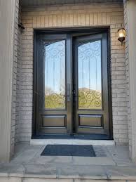 Double Door With Wrought Iron Inserts