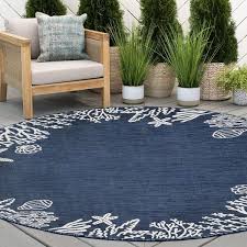 51 Outdoor Rugs To Make Your Patio Feel