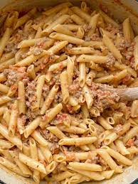 creamy tomato beef pasta together as