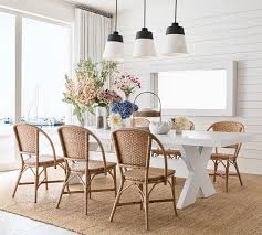 Round tables typically have a pedestal base and are great for fitting into a corner or squeezing extra guests around. Modern Farmhouse Extending Dining Table Pottery Barn
