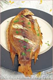 whole baked tilapia with flat leaf