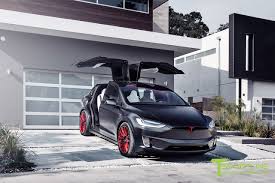Now only solid black comes with the base price of the car. Custom Satin Black Tesla Model X With Mx114 22 Inch Forged Wheels In Imperial Red By T Sportline Tesla Model X Tesla Model Tesla Sports Car