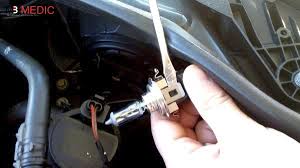 how to replace low beam headlight bulb