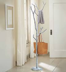 Why not make this rustic coat rack out of them? Tree Branch Coat Rack Bronze Vivaterra