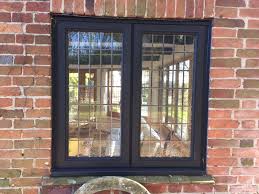 Oak Windows And Doors With Leaded Glass