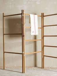 The dowels will support the clothing and the spacing will depend on the size of your specific frame, but something around six to eight inches works well. 10 Easy Pieces Wooden Laundry Racks The Organized Home