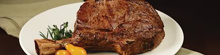 thick cut bone in ribeye cowboy steak