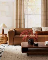 decorate around brown leather sofas