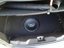 subwoofer in spare tire well jaguar