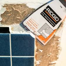repair torn drywall paper with zinsser