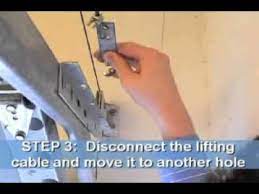 how to fix garage door tension you