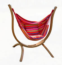 Modern sleek porch furniture would benefit from a touch of whimsy if you bring a very ornate swing with decorative back and armrests. Wooden Arc Hammock Stand Curved Outdoor Hammock Swing Hanging Chairs