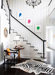 Perhaps the easiest hallway ideas to make a statement with your staircase is to get creative with hallway wallpaper, paint and textiles. How To Decorate A Staircase Wall The Zhush Blog