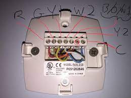 The thermostat has seven wires connected to terminals labeled c, r, w2, e, y1 and w1 together (with a jumper), o/b, and g. Nest Thermostat Stage 2 Cooling Problem Nest