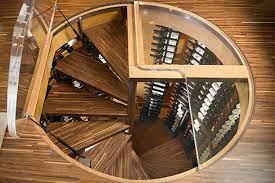 spiral staircase that is also a wine cellar