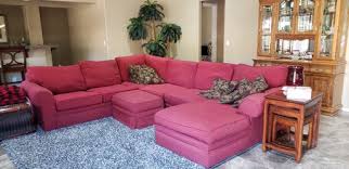 used red sectional sofa with ottoman