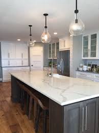 Fortune favors the bold in modern design, and few things dial up the drama in the kitchen like crisp white cabinets with dark gray quartz. 35 Quartz Kitchen Countertops Ideas With Pros And Cons Digsdigs
