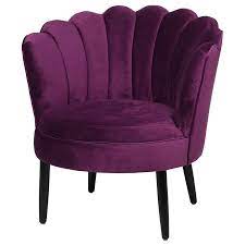 Its smooth and soft velvet upholstery in a vivid violet shade combined with slanted wooden legs gives the design a retro feel. Luxen Purple Velvet Petal Chair Shropshire Design