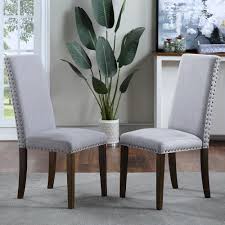 Choose from opulent leather effect, country style wood and modern upholstered designs, as well as sleek metal. Harper Bright Designs Light Grey Upholstered Dining Chairs Set Of 2 Wf189457eaa The Home Depot
