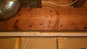 electrician drill hole in support beam