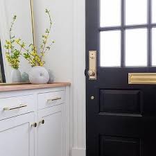 Black Door With Brass Mail Slot Design