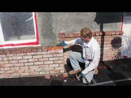 How To Cement Plaster A Brick Wall