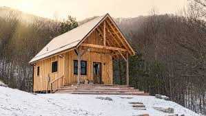 The team is thrown for a loop when the homeowners change the design with just three weeks to spare. Rustic Cabin With Wrap Around Porch Steps Rustic Exterior Other By River Birch Builders Houzz
