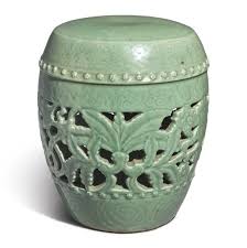 A Carved And Reticulated Celadon Glazed
