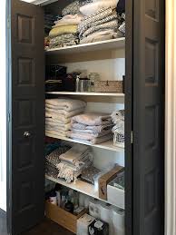 Labeled baskets will keep items in their proper place and make everything easy to find. Organized Linen Closet The Reveal Citrineliving
