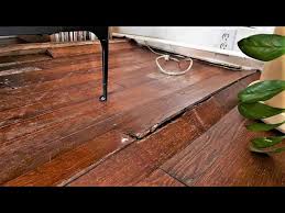 fix a buckled wood floor