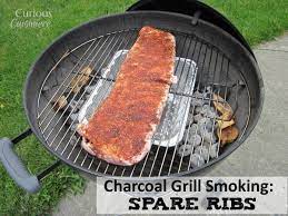 charcoal grill smoking spare ribs