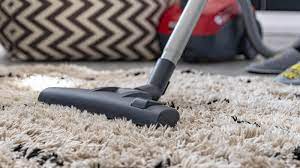 how to vacuum rug