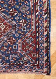 a c19th triple medallion kazak rug